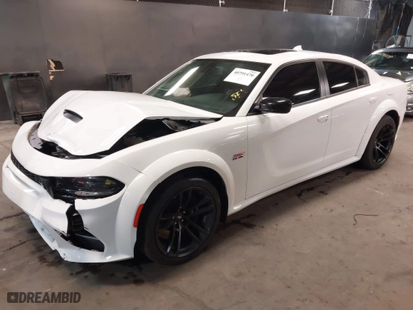 2023 Dodge Charger Scat Pack Widebody with VIN 2C3CDXGJ7PH556888, listed as a IAAI auction lot 40791470 with 11,887 mi miles. Bid and sale history available at carsss.com. Image 17.