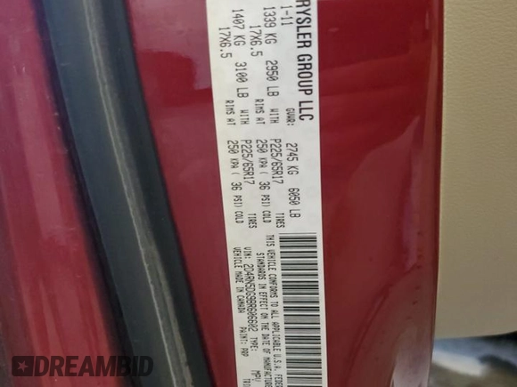 2011 Dodge Grand Caravan Crew with VIN 2D4RN5DG9BR606602, listed as a Copart auction lot 69881504 with 129,575 mi miles and Salvage Title. Bid and sale history available at DreamBid. Image 13.
