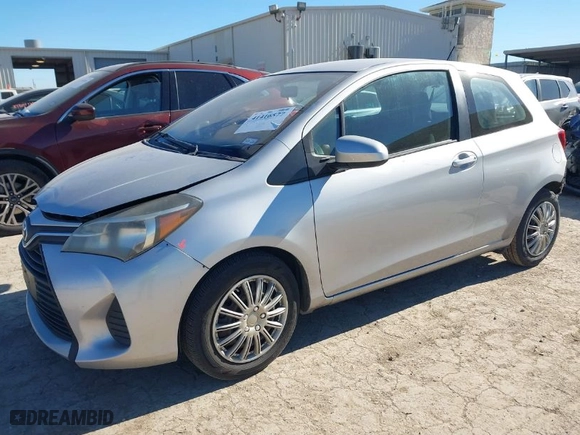2015 Toyota Yaris L with VIN VNKJTUD38FA020465, listed as a IAAI auction lot 41416577 with 142,751 mi miles. Bid and sale history available at carsss.com. Image 2.