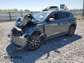 2018 Mazda CX-5 Grand Touring z VIN JM3KFBDM3J0351106, wystawiony jako Copart lot #52553925 z przebiegiem Nie podano mil oraz Szkody całkowita. Historia ofert i sprzedaży dostępna na DreamBid. Obrazek 1.