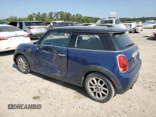 2014 MINI Hardtop with VIN WMWXM5C59ET972044, listed as a Copart auction lot 52519775 with 91,490 mi miles and Clean Title. Bid and sale history available at DreamBid. Image 2.