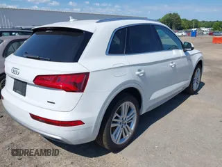 2019 Audi Q5 Premium Plus z VIN WA1BNAFY1K2139360, wystawiony jako IAAI lot #42465344 z przebiegiem 84 156 mil mil oraz . Historia ofert i sprzedaży dostępna na DreamBid. Obrazek 4.