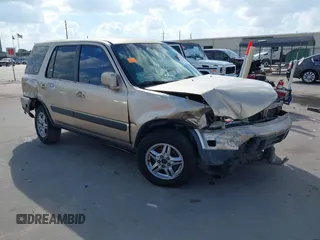 2000 Honda CR-V SE with VIN JHLRD1873YC039813, listed as a IAAI auction lot 40716079 with 214,067 mi miles. Bid and sale history available at carsss.com. Image 1.