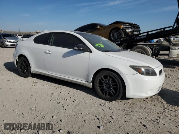 2009 Scion tC z VIN JTKDE167190282832, wystawiony jako Copart lot #53359705 z przebiegiem 227 341 mil mil oraz Szkoda całkowita • Salvage title. Historia ofert i sprzedaży dostępna na DreamBid. Obrazek 4.