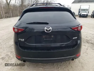 2018 Mazda CX-5 Grand Touring with VIN JM3KFBDM0J0327927, listed as a Copart auction lot 51800825 with 203,126 mi miles and Clean Title. Bid and sale history available at carsss.com. Image 6.