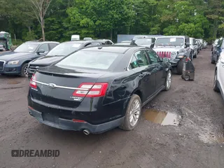2014 Ford Taurus Limited z VIN 1FAHP2J8XEG112310, wystawiony jako IAAI lot #42367397 z przebiegiem 77 329 mil mil oraz . Historia ofert i sprzedaży dostępna na DreamBid. Obrazek 4.