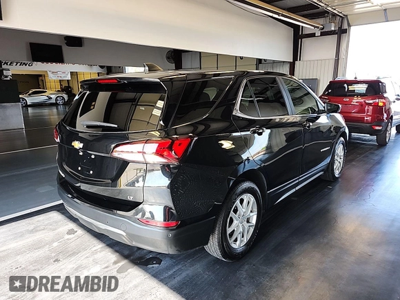2022 Chevrolet Equinox LT with VIN 3GNAXJEV3NL143228, listed as a IAAI auction lot 42802323 with 100,874 mi miles and . Bid and sale history available at DreamBid. Image 7.