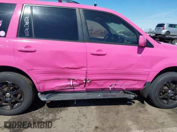 2003 Honda Pilot EX with VIN 2HKYF18433H612070, listed as a IAAI auction lot 41852286 with 242,891 mi miles and . Bid and sale history available at DreamBid. Image 6.