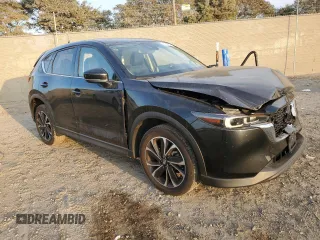 2023 Mazda CX-5 2.5 S Premium Plus Package with VIN JM3KFBEM7P0170811, listed as a Copart auction lot 87335674 with 43,799 mi miles and Salvage Title. Bid and sale history available at carsss.com. Image 4.