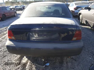 1999 Saturn SL with VIN 1G8ZH5289XZ336486, listed as a Copart auction lot 83240394 with Not Provided miles and Non Repairable. Bid and sale history available at carsss.com. Image 6.
