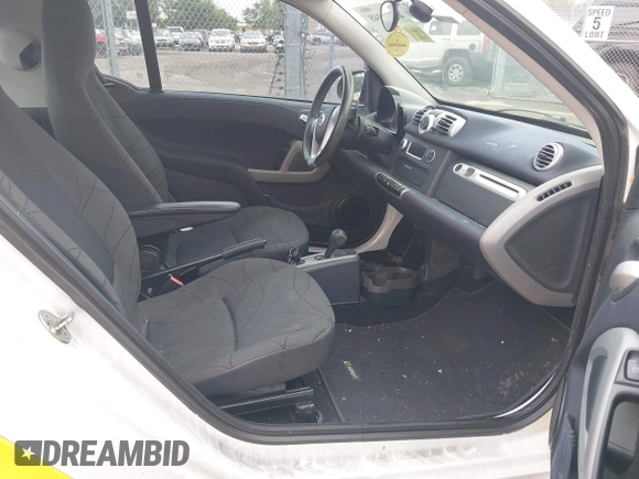 2014 Smart fortwo Pure z VIN WMEEJ3BA0EK738873, wystawiony jako IAAI lot #41993948 z przebiegiem 88 946 mil mil oraz . Historia ofert i sprzedaży dostępna na DreamBid. Obrazek 5.