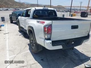 2021 Toyota Tacoma SR5 with VIN 3TMDZ5BN5MM118710, listed as a IAAI auction lot 42460278 with 60,310 mi miles and . Bid and sale history available at DreamBid. Image 3.