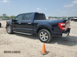 2021 Ford F-150 XL with VIN 1FTFW1CD1MFB42051, listed as a Copart auction lot 51463965 with 46,549 mi miles and Salvage title. Bid and sale history available at DreamBid. Image 2.