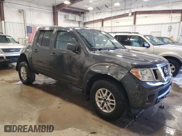 2015 Nissan Frontier Pro-4X with VIN 1N6AD0EV8FN703027, listed as a Copart auction lot 55217005 with 175,794 mi miles and Salvage title. Bid and sale history available at DreamBid. Image 4.