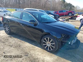 2018 Volvo S60 Inscription with VIN LYV402HK6JB163906, listed as a IAAI auction lot 41485767 with 72,184 mi miles and . Bid and sale history available at DreamBid. Image 1.