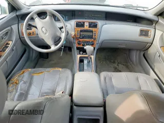 2002 Toyota Avalon XL z VIN 4T1BF28B22U200555, wystawiony jako Copart lot #54544265 z przebiegiem 146 031 mil mil oraz Tytuł czysty. Historia ofert i sprzedaży dostępna na DreamBid. Obrazek 8.