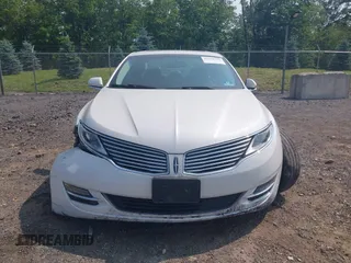 2016 Lincoln MKZ z VIN 3LN6L2JK8GR626690, wystawiony jako IAAI lot #42438226 z przebiegiem 51 678 mil mil oraz . Historia ofert i sprzedaży dostępna na DreamBid. Obrazek 12.