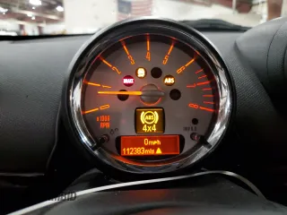 2013 MINI Countryman S ALL4 with VIN WMWZC5C5XDWM16477, listed as a Copart auction lot 51666385 with 112,383 mi miles and Salvage title. Bid and sale history available at DreamBid. Image 9.