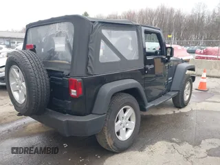 2014 Jeep Wrangler Sport with VIN 1C4AJWAG9EL312856, listed as a IAAI auction lot 42022870 with 98,323 mi miles and . Bid and sale history available at DreamBid. Image 4.