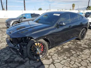 2024 BMW X6 xDrive40i with VIN 5UX33EX09R9S35818, listed as a Copart auction lot 89089515 with 26,955 mi miles and Salvage Title. Bid and sale history available at carsss.com. Image 1.