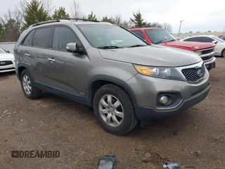 2012 Kia Sorento LX with VIN 5XYKTDA21CG244973, listed as a IAAI auction lot 41268549 with 211,858 mi miles. Bid and sale history available at carsss.com. Image 1.
