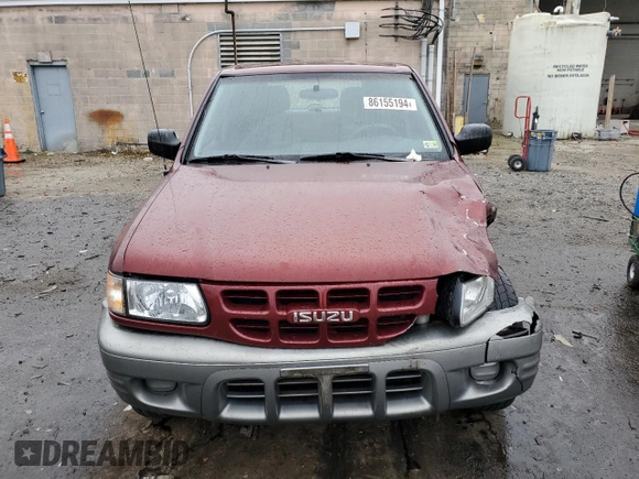2002 Isuzu Rodeo z VIN 4S2CK58D124323937, wystawiony jako Copart lot #86155194 z przebiegiem 184 491 mil mil oraz Szkoda całkowita • Salvage title. Historia ofert i sprzedaży dostępna na DreamBid. Obrazek 5.