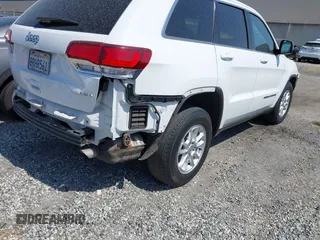 2020 Jeep Grand Cherokee Altitude with VIN 1C4RJEAG3LC202749, listed as a IAAI auction lot 42272959 with 90,698 mi miles and . Bid and sale history available at DreamBid. Image 4.