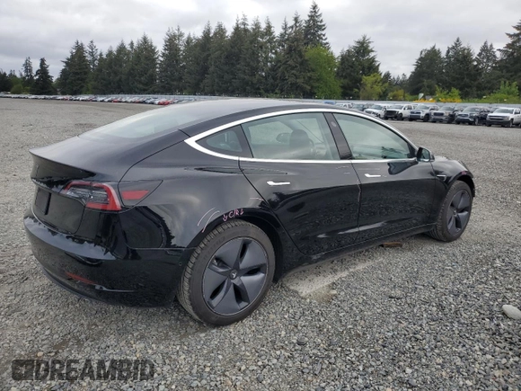 2019 Tesla Model 3 Mid Range z VIN 5YJ3E1EA2KF361787, wystawiony jako Copart lot #56059465 z przebiegiem 50 186 mil mil oraz Szkody całkowita. Historia ofert i sprzedaży dostępna na DreamBid. Obrazek 3.