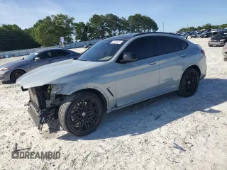 2022 BMW X4 M z VIN 5YM23EC09N9L83620, wystawiony jako Copart lot #58009214 z przebiegiem 21 587 mil mil oraz Szkody całkowita. Historia ofert i sprzedaży dostępna na DreamBid. Obrazek 1.