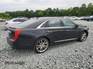 2013 Cadillac XTS Premium z VIN 2G61S5S37D9169935, wystawiony jako Copart lot #57515415 z przebiegiem 122 144 mil mil oraz Szkoda całkowita • Salvage title. Historia ofert i sprzedaży dostępna na DreamBid. Obrazek 3.