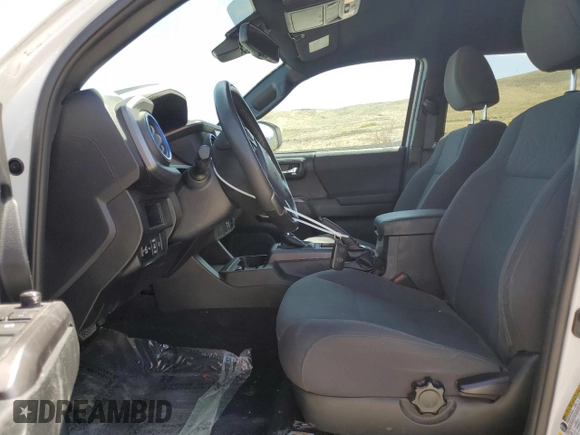 2019 Toyota Tacoma SR z VIN 3TMCZ5AN1KM263494, wystawiony jako Copart lot #54710695 z przebiegiem 57 216 mil mil oraz Szkoda całkowita • Salvage title. Historia ofert i sprzedaży dostępna na DreamBid. Obrazek 7.