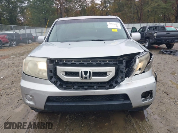2010 Honda Pilot Touring with VIN 5FNYF3H89AB005861, listed as a IAAI auction lot 40828747 with 275,757 mi miles and . Bid and sale history available at DreamBid. Image 6.