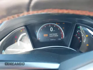 2020 Honda Civic Si with VIN 2HGFC1E59LH707904, listed as a IAAI auction lot 41621372 with 112,077 mi miles and . Bid and sale history available at DreamBid. Image 7.