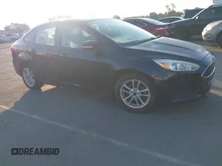 2017 Ford Focus SE with VIN 1FADP3F2XHL251700, listed as a IAAI auction lot 42632094 with 165,308 mi miles and . Bid and sale history available at DreamBid. Image 1.