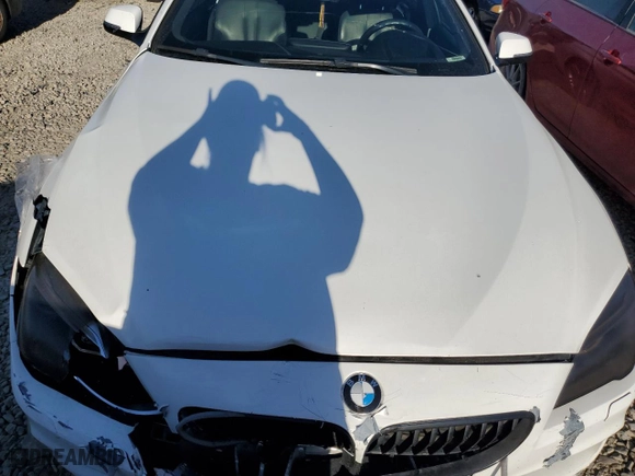 2016 BMW 6 Series 640i xDrive with VIN WBA6D2C54GGT65829, listed as a Copart auction lot 60148374 with 102,444 mi miles and Salvage Title. Bid and sale history available at carsss.com. Image 11.