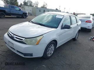 2010 Ford Focus SE with VIN 1FAHP3FN5AW146403, listed as a IAAI auction lot 40955575 with 128,243 mi miles. Bid and sale history available at carsss.com. Image 18.