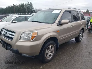 2006 Honda Pilot EX-L with VIN 2HKYF18706H529579, listed as a IAAI auction lot 41861069 with 222,641 mi miles and . Bid and sale history available at DreamBid. Image 2.