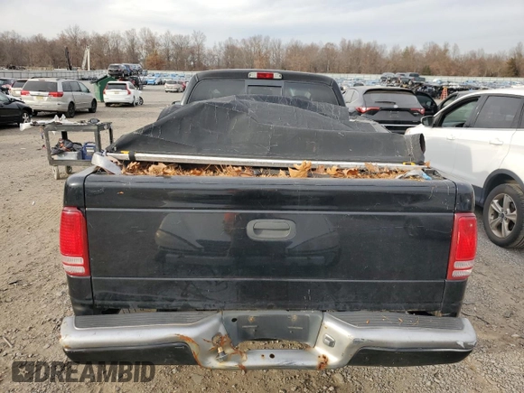 2003 Dodge Dakota с VIN 1D7HG32X93S273172, выставлен на аукционе Copart как лот 80704424 с пробегом 141 409 миль миль и Списание • Salvage title. История ставок и продаж доступна на DreamBid. Изображение 6.