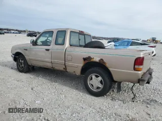 1997 Ford Ranger XLT with VIN 1FTCR14X0VPA08209, listed as a Copart auction lot 80486034 with 216,664 mi miles and Clean Title. Bid and sale history available at DreamBid. Image 2.