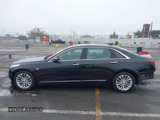 2017 Cadillac CT6 Plug-In RWD with VIN LREKK5RX4HA044882, listed as a IAAI auction lot 41241965 with 79,620 mi miles and . Bid and sale history available at DreamBid. Image 15.