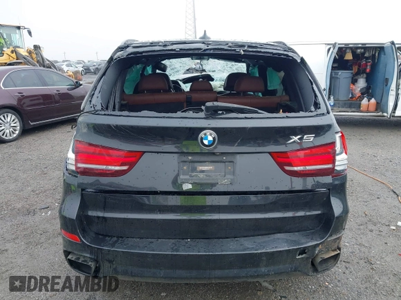 2015 BMW X5 xDrive50i z VIN 5UXKR6C56F0J78575, wystawiony jako IAAI lot #41933018 z przebiegiem Nie podano mil oraz . Historia ofert i sprzedaży dostępna na DreamBid. Obrazek 17.