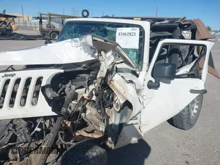 2010 Jeep Wrangler Mountain with VIN 1J4AA2D14AL173286, listed as a IAAI auction lot 41661821 with Not Provided miles and . Bid and sale history available at carsss.com. Image 6.