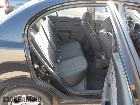 2010 Kia Rio LX with VIN KNADH4A33A6668719, listed as a IAAI auction lot 41777544 with 124,400 mi miles. Bid and sale history available at carsss.com. Image 8.