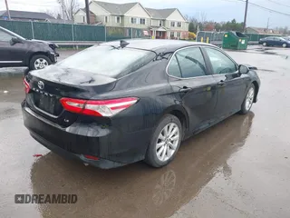 2019 Toyota Camry LE with VIN 4T1B11HK2KU263910, listed as a IAAI auction lot 42060008 with 31,433 mi miles and . Bid and sale history available at DreamBid. Image 4.