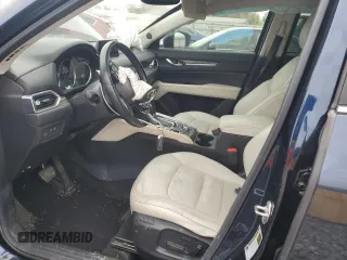 2017 Mazda CX-5 Grand Touring with VIN JM3KFADL3H0125143, listed as a Copart auction lot 50178005 with 160,058 mi miles and Salvage Title. Bid and sale history available at carsss.com. Image 7.