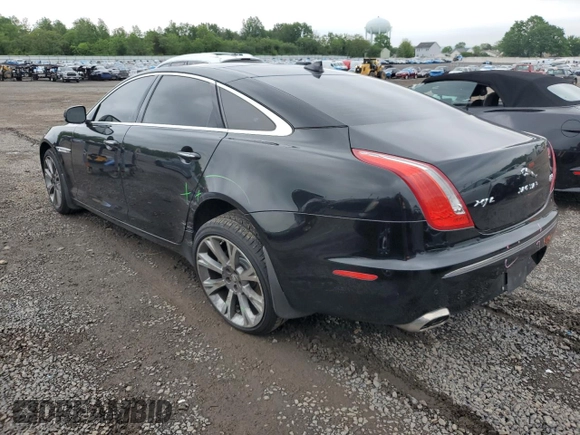 2013 Jaguar XJ Portfolio with VIN SAJWJ2GD0D8V44292, listed as a Copart auction lot 57073775 with 100,458 mi miles and Salvage Title. Bid and sale history available at DreamBid. Image 2.