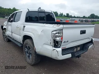 2017 Toyota Tacoma SR5 with VIN 3TMCZ5AN6HM073912, listed as a IAAI auction lot 39958507 with 171,178 mi miles and . Bid and sale history available at DreamBid. Image 3.