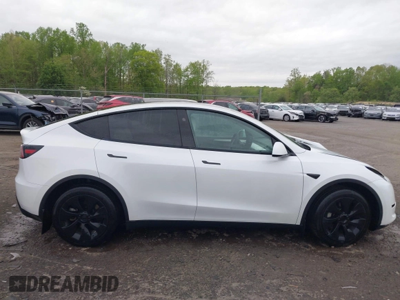 2024 Tesla Model Y Long Range with VIN 7SAYGAEE2RF014315, listed as a IAAI auction lot 42053183 with 36,521 mi miles and . Bid and sale history available at DreamBid. Image 13.