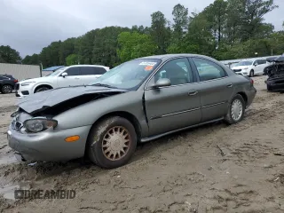 1999 Mercury Sable LS with VIN 1MEFM53U6XG646248, listed as a Copart auction lot 57859405 with 128,286 mi miles and Salvage title. Bid and sale history available at DreamBid. Image 1.