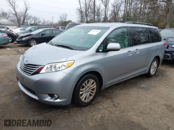 2014 Toyota Sienna XLE with VIN 5TDYK3DC5ES461184, listed as a IAAI auction lot 41447642 with 122,539 mi miles. Bid and sale history available at carsss.com. Image 2.